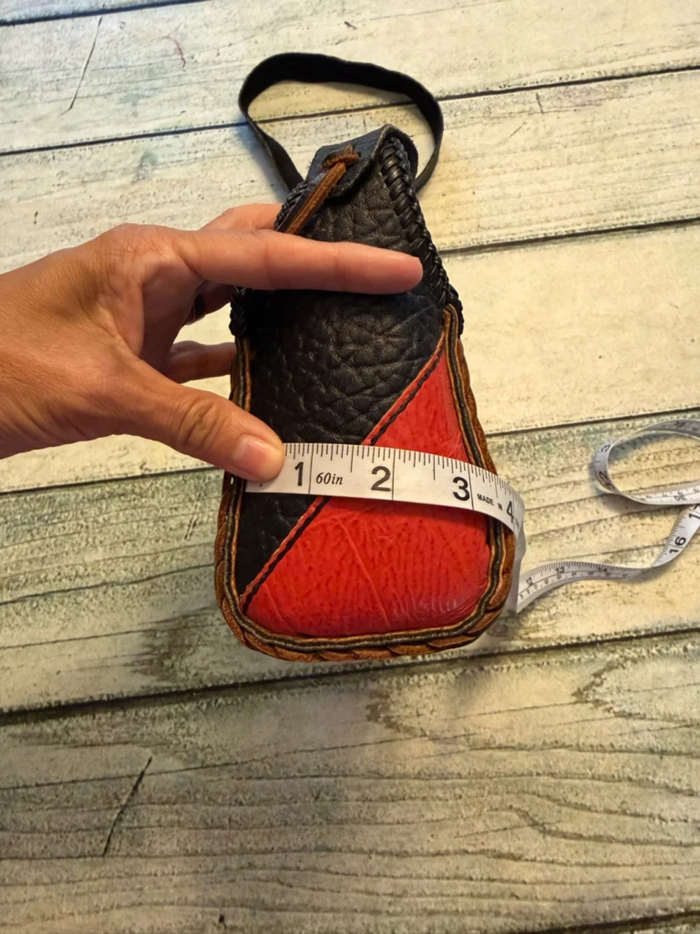 Vintage western leather black and red braided sides fringe shoulder bag purse.